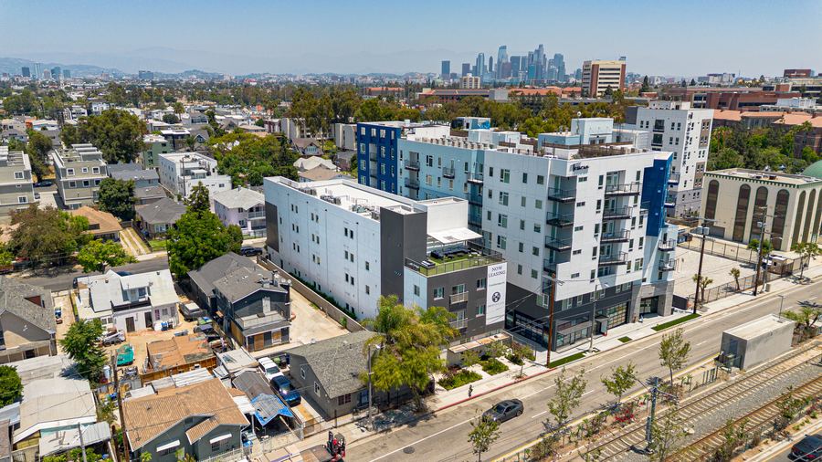 Aerial drone photo of 1073 Exposition Blvd, 44-bed student housing property near USC with DTLA skyline