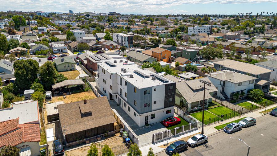 Aerial drone photo of 3754 S Harvard Blvd, master leased new construction in Exposition Park, Los Angeles